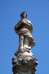 Statue of Virgin Mary on a column in front of the Church of St. Catherine of Alexandria in Krapina, Croatia