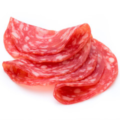 Salami smoked sausage slices isolated on white background cutout.