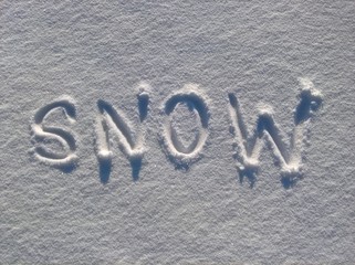 Snow Inscription In Fresh Snow. Handwritten in the snow surface.