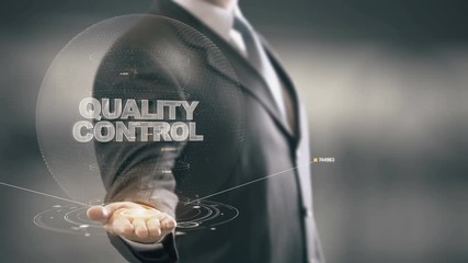Quality Control with hologram businessman concept