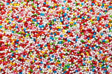 Multicoloured sweet sugar balls. Small ball pattern.