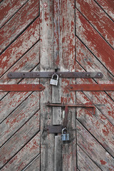 The old door locked with a padlock hanging brackets. Set of backgrounds