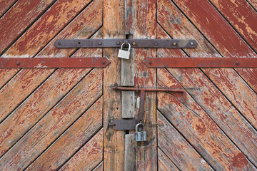 The old door locked with a padlock hanging brackets. Set of backgrounds