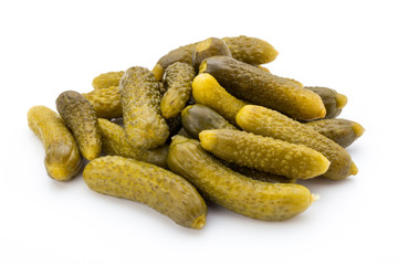 Marinated pickled cucumbers isolated on the white.