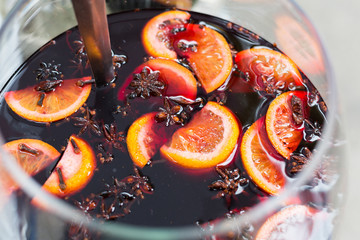 Making mulled wine for sale at country fair, closeup