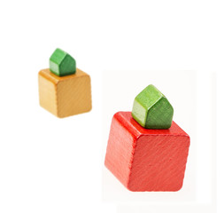 Holzklötze als Symbolfoto für Immobilien