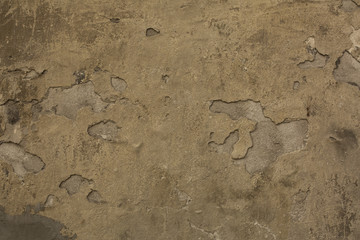 Ancient plaster grungy wall background. Closeup shot