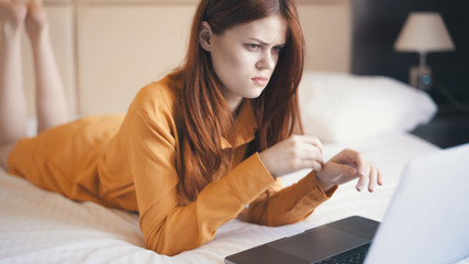 woman looking at laptop with perplexity