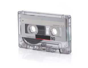 Obraz premium Vintage black compact cassette on white background