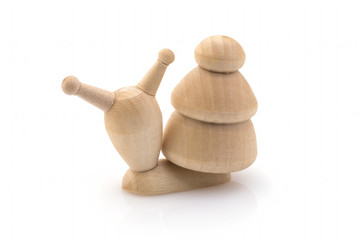 A snail made of wood, a statuette for coloring