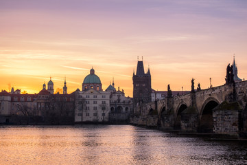 Naklejka premium Charles Bridge (Karluv Most) and Old Town Tower, the most beautiful bridge in Czechia. Prague, Czech Republic.