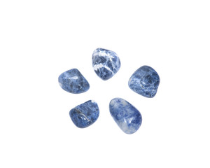 Faceted round beads of blue and white sodalite from Africa isolated on white background