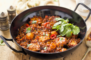Chicken piri piri hot and sour curry made with marinated chicken breast, onions, tomatoes and red chillies