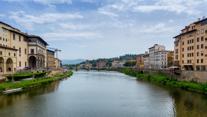 Fototapeta na wymiar Ponte Vecchio, famous old bridge in Florence on the Arno river, Italy