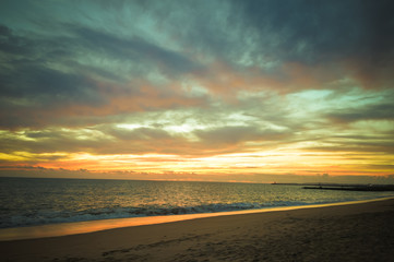 Fototapeta na wymiar Magic hour of natural colorful dawn over the sea sunny background outdoor