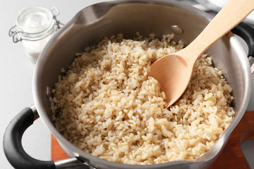 Prepared brown rice in saucepan
