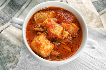 Soup pot with chicken tikka masala, closeup