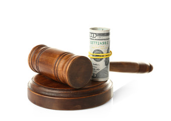 Judge's gavel and money on white background