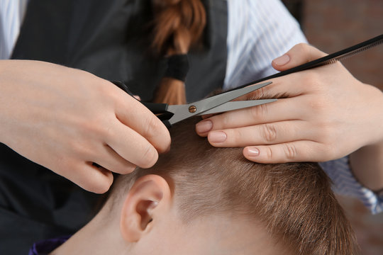 Little boy in hairdressing salon, closeup