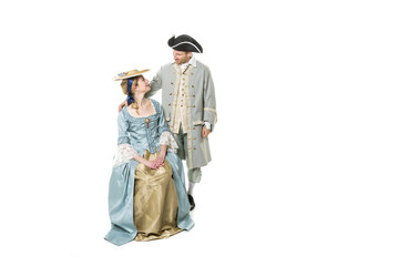 beautiful couple in long medieval dress isolated on white