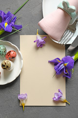 Beautiful Easter composition with empty card on gray background