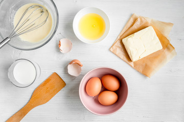 cooking pancake on white background top view ingredients for making