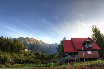 The peak view of Mount Kinabalu from the lodge by the foot of the mount during sunrise