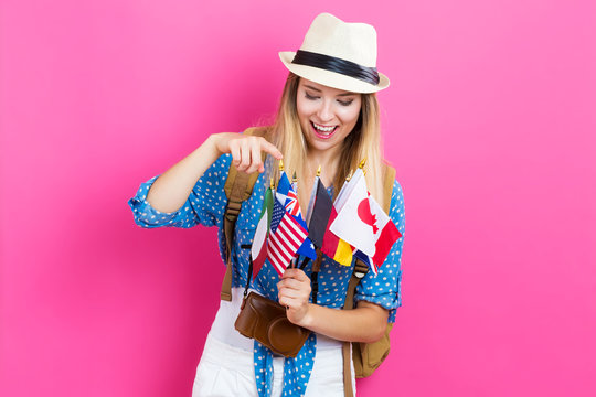 Young Woman Deciding Where To Travel