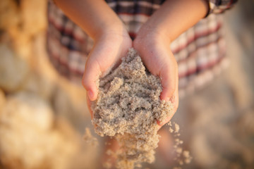 child play sand on summer beach