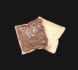 Closeup two slice bread for breakfast with chocolate for breakfast isolated on black background with clipping path