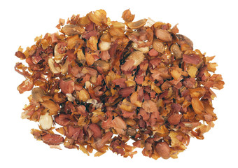 Skin peels from fried  peanut  nuts