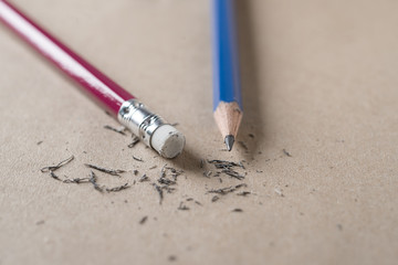 Eraser and error with sharpened pencil concept