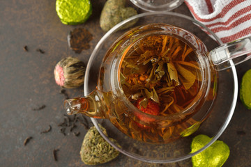 Flowering tea in a glass teapot