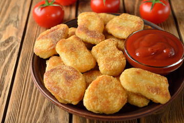 Chicken nuggets with ketchup