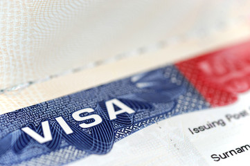 close up on USA visa on the passport - obrazy, fototapety, plakaty