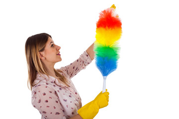 Attractive female housekeeper holding a flannel