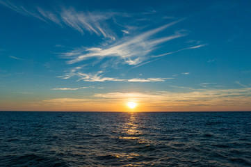 Naklejka na ściany i meble Sunset landscape with sea. Seascape