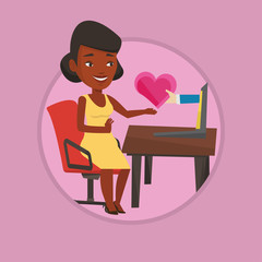 Young woman dating online using laptop.