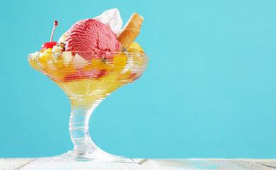 Side view on fruity ice cream and fruit dessert