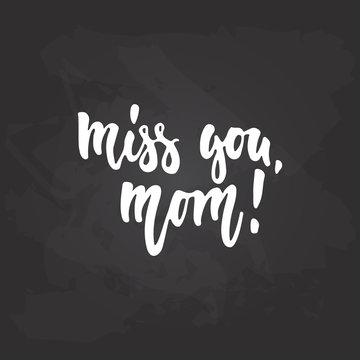 Miss you, mom - hand drawn lettering phrase for Mother's Day on the black chalkboard background. Fun brush ink inscription for photo overlays, greeting card or t-shirt print, poster design.