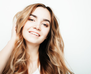 Naklejka premium lifestyle and people concept: Young casual woman portrait. Clean face, curly hair. 