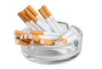 Glass ashtray and cigarette on white background