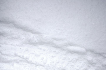 Fototapeta na wymiar snow background.the fluffy white texture of the snow
