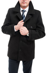 Obraz na płótnie Canvas Middle age elegant man posing wearing overcoat