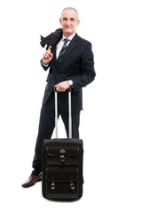 Middle age business man posing with carry on luggage