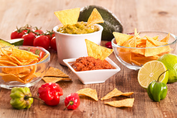 Guacamole and nacho chips. 