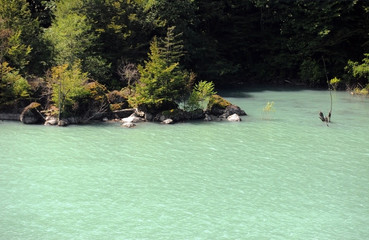 Meltwater Lake in Georgia, Europe: Close-up of aqua hued opaque meltwater lake in Georgia, Europe. 