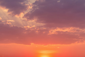 Colorful dramatic sky with cloud at sunset.Sky with sun background
