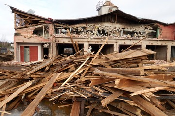 Pile of wooden planks at demolition site ready the recycling