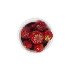 bowl with strawberries isolated on white background. Ripe strawberries close-up. Background berry. Sweet and juicy berry with copy space for text. Top view.